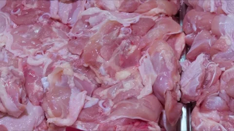Close up of raw chicken meat on display in store Stock Footage 289467563