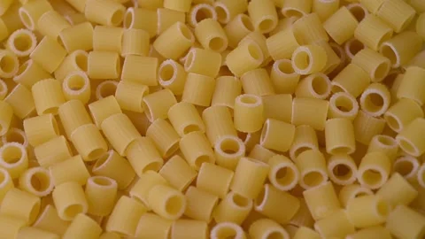 Close up of raw Italian  pasta, rotating Stock Footage 168320366