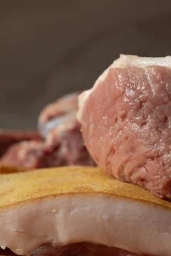 Close-up of raw pork leg on cutting board in a home kitchen, authentic butc.. Stock Photos