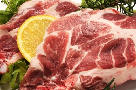 Close up on raw steak Stock Photos