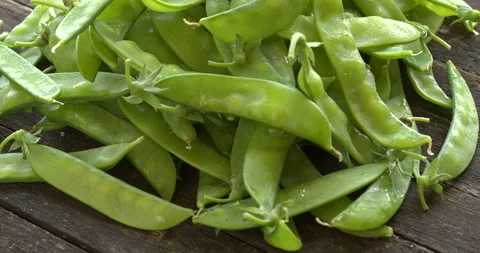 Close-up of raw sugar snap pea pile. Stock Footage 308748181
