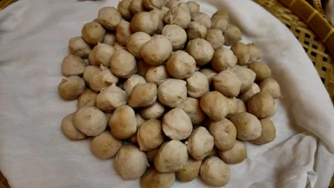 Close Up of Raw Thai Nuts or Seeds in Basket Natural Organic Food Ingredient 4K Stock Footage 331239296