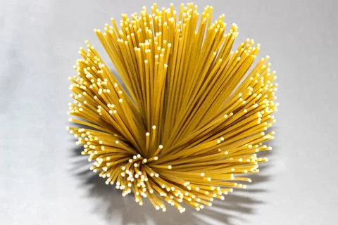 Close-up of raw thin spaghetti with shadow. Foto stock