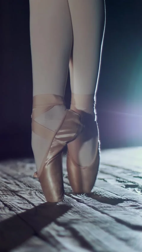 Close up, in rays of spotlight, on the stage of the old theater hall. ballerinas Stock Footage 314431037
