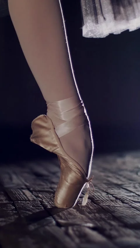 Close up, in rays of spotlight, on stage of old theater hall. ballerina in white Stock Footage 315090316