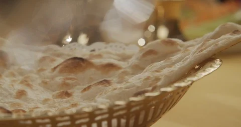 Close-up of ready chapat, naan bread oil on top. Slow motion video 4K Stock Footage 124770642