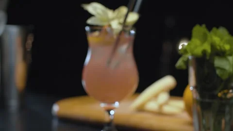 Close up ready-made cherry sling cocktail. Motion control system. Stock Footage 132918081