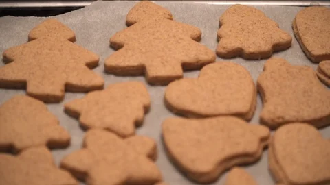 Close-up of ready-made gingerbread cookies are lying on the table  Stock Footage 99156954