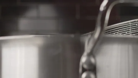 Close-up with ready-made noodles drained from colander. Slow motion video Stock Footage 114305745