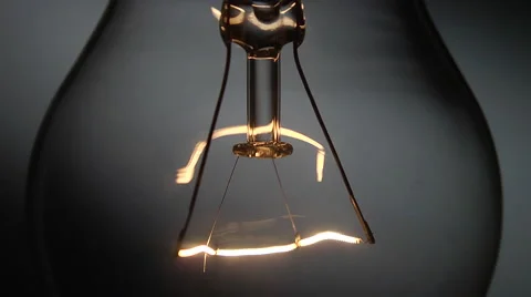 Close up of real tungsten lamp blinks Stock Footage 47646516