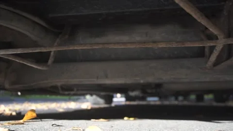 Close-up of the rear beam suspension of a light car Stock Footage 296486358