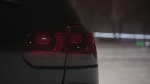 A close-up of the rear lights of the car Stockbeeldmateriaal 147978898