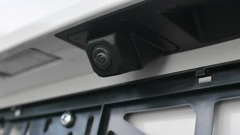 Close-up of rear view camera on modern car, highlighting advanced safety, Stock Footage 311231894