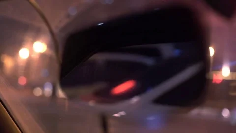 Close up of rear view mirror and focus as car pulls in, China 스톡 동영상 84757934