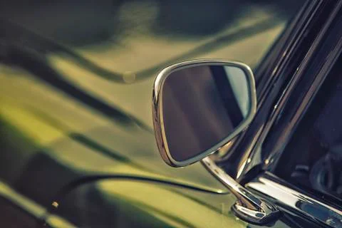 Close up on Rear view mirror on greenv intage car. Stock Photos