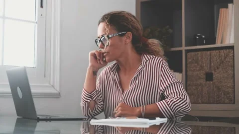 Close up rear view stressed young woman touching lower back feeling discomfort,  Stock-Footage 151322212