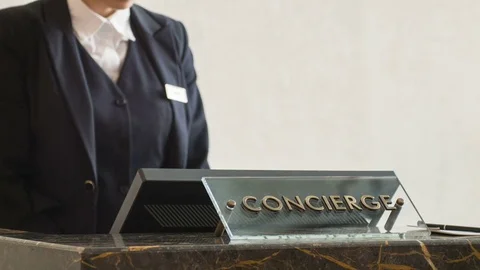 Close up on receptionist answering call Stock Footage 74761010