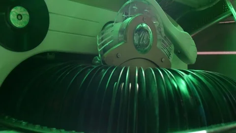 Close-up of the record changing internal gears of an antique jukebox Stock Footage 97856179