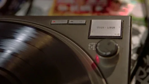 Close up of a record player being switched off Stock Footage 84483318