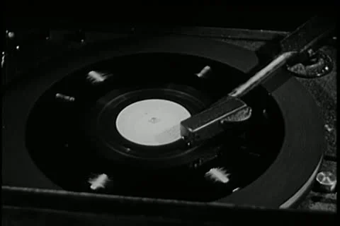 Close-up of record playing on vintage record player Stock Footage 11356277