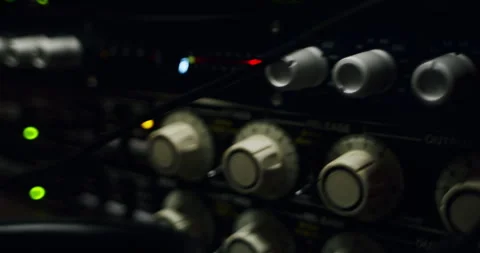 Close-Up Of Recording Studio Engineer Adjusting Dials 4K 24FPS Stock Footage 253446084