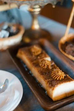 Close-up of rectangular dessert on dark tray Stock Photos