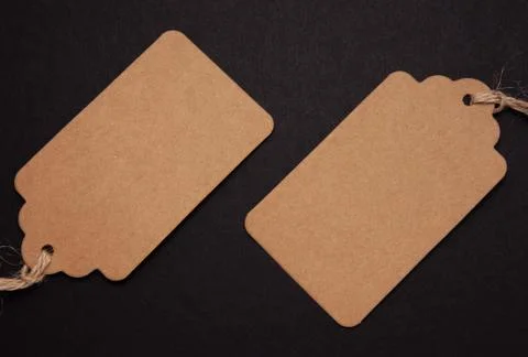 Close-up, rectangular price tags on a black background, the concept of expens Stock-Fotos