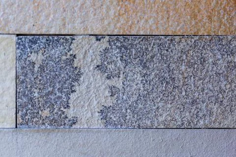 Close-up of Rectangular Stone Tiles with Varied Textures Stock Photos