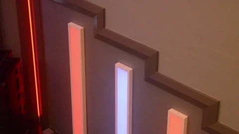 Close up of red and white art deco lights at a theatre Stock Footage 260408627