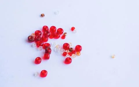 Close up of red and white beads isolated Stock Photos