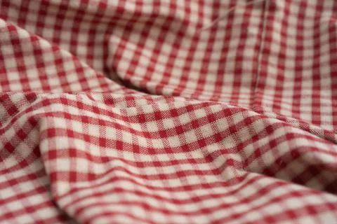 Close up of red and white checkered plaid gingham pattern tablecloth. Classic Stock Photos