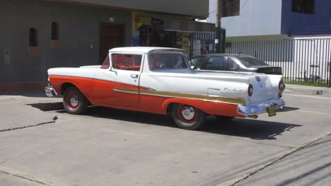 Close-up of a red and white Ford Ranchero classic car Video stock 150686936