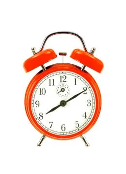 Close up of a red bell clock (alarm clock) isolated on white background Fotos Stock
