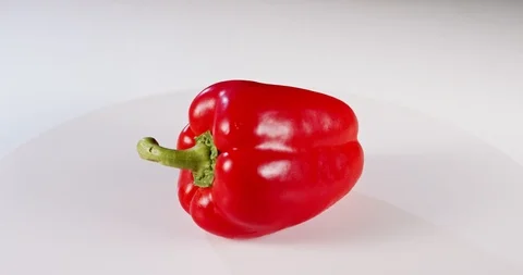 Close up a Red bell pepper rotating on a white background Stock Footage 125520934
