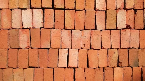 Close Up of Red Brick Rows Creating Construction Background Vídeos de archivo 337623488