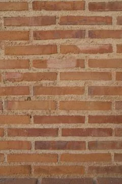 Close-up of red brick wall with rustic texture Stock Photos