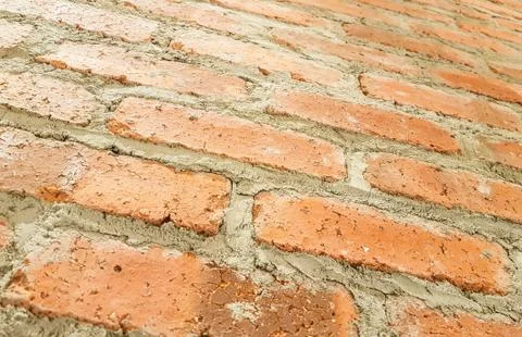 Close-up Red brick wall texture on tilted Concept for interior or exterior Stock Photos