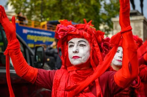 Close up of Red Brigade protesters at an Extinction Rebellion protest Foto stock