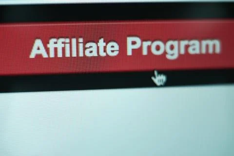 Close up Red button affiliate program on a  white background. Stock Photos