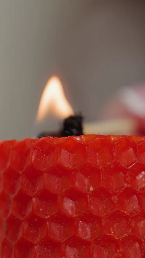 Close Up of Red Candle Being Lit by Hand with Neatly Manicured Nails Stock Footage 320370481