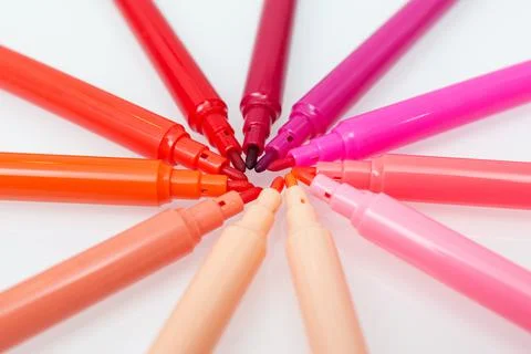 Close up of red colored felt-tip pens on isolated background. Selective focus Stock Photos
