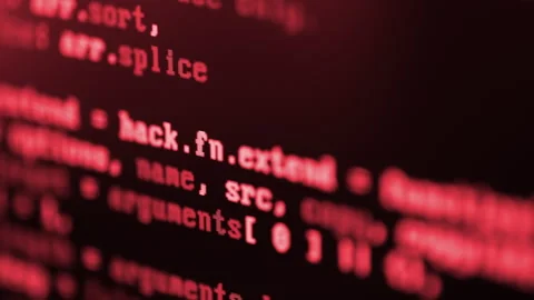 Close up of red computer screen with programming code, hacker cyber attack Stockbeeldmateriaal 318067220