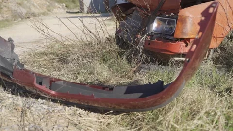 Close-up of a red crashed car in an accident Stock Footage 303575276