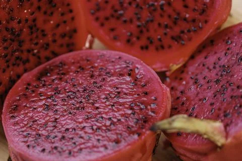 Close-up of red dragon fruit cut in half Stock Photos