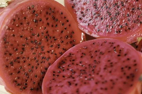Close-up of red dragon fruit cut in half Stock Photos