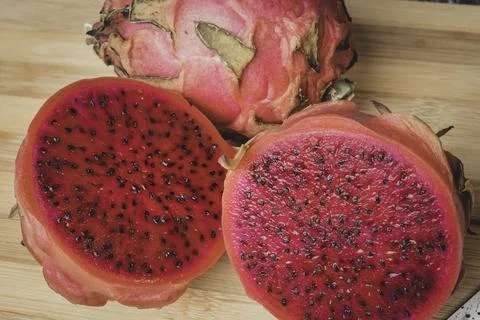 Close-up of red dragon fruit cut in half Stock Photos