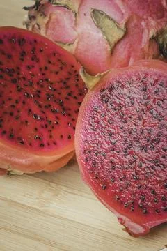 Close-up of red dragon fruit cut in half Fotos Stock