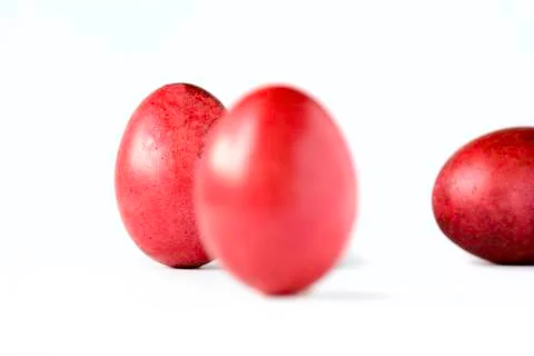 Close up of a red easter egg isolated on white. Stock Photos