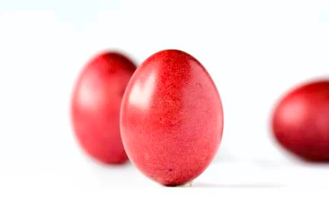 Close up of a red easter egg isolated on white. Stock Photos