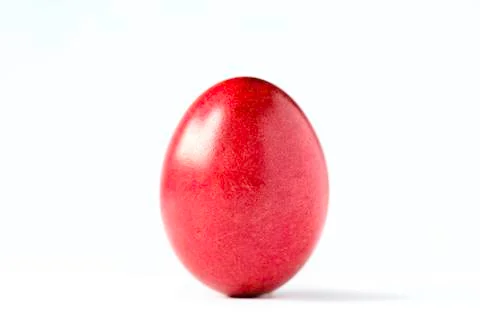 Close up of a red easter egg isolated on white. Stock Photos